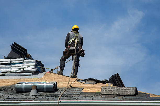 Professional Roofing technician working in Tillamook, OR